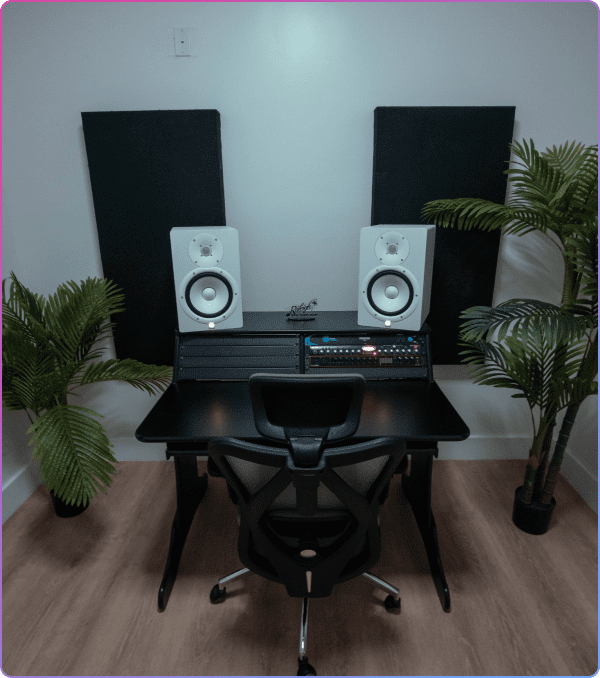 Home music studio setup with laptop.